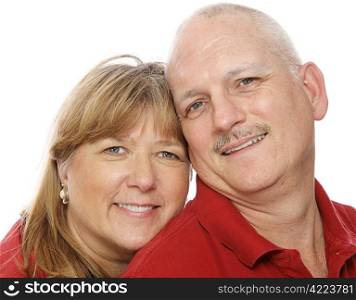 Closeup headshot of a mature couple in love. White background.