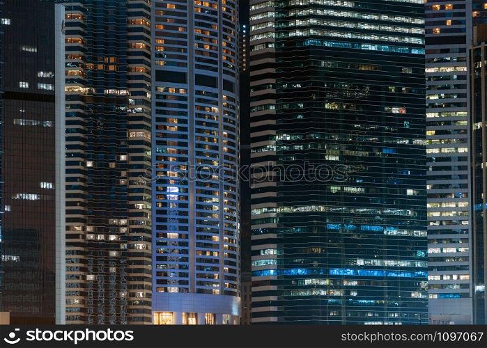 Closeup Hong Kong Cityscape skyscraper at night time, business financial district, tourist and travel destination, architecture building and landmark concept