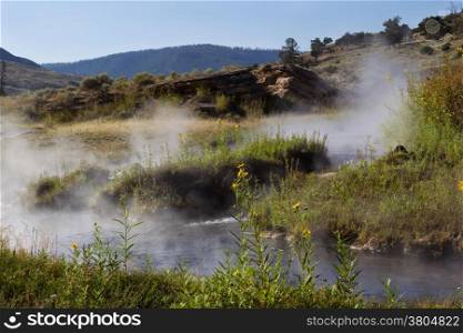 Closeup horizontal image of natural hot springs, for public bathing, near Garner River in northern part of Yellowstone National Park