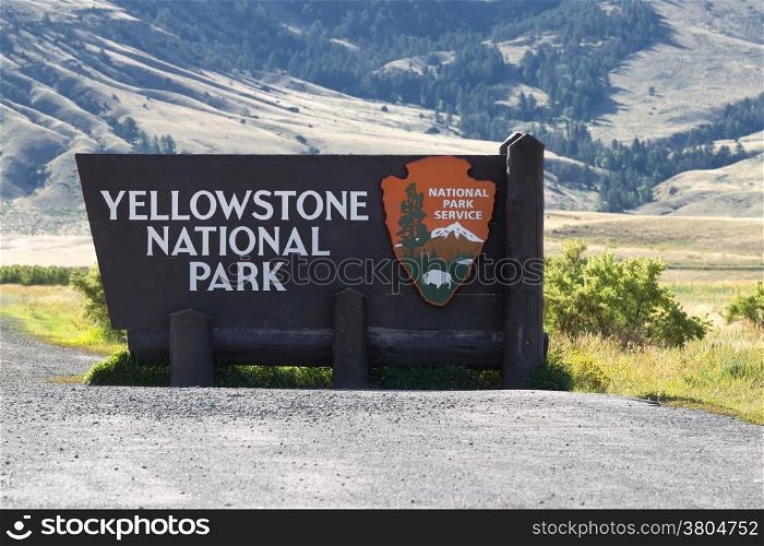 Closeup horizontal image of Yellowstone National Park sign at the north entrance in Montana