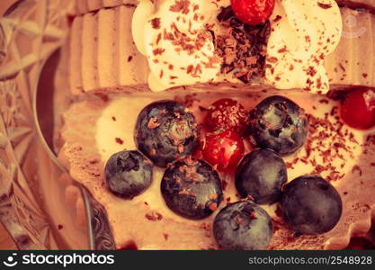 Closeup ice cream dessert decorated with berry fruit