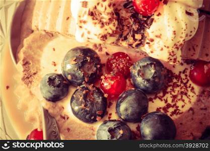 Closeup ice cream dessert decorated with berry fruit