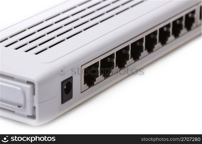 Closeup image of a network switch holes unplugged