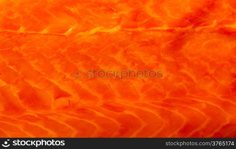 Closeup macro of fresh salmon. Red fish redfish raw meat as food background texture pattern.