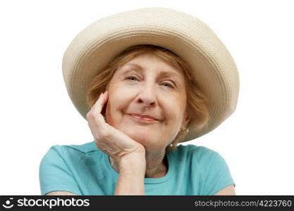 Closeup of a beautiful senior woman in a summer hat. Isolated on white