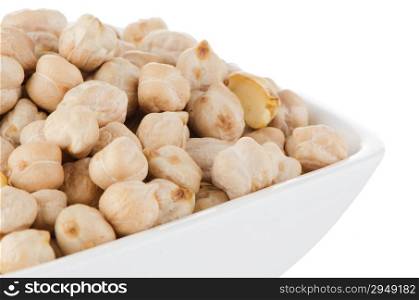 Closeup of a bowl with chickpeas on a white background