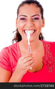 closeup of a cute girl brusing her teeth in isolated white backround