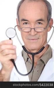 Closeup of a doctor with a stethoscope
