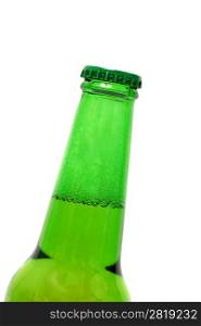 Closeup of a green beer bottle cap and neck Bottle is at an angle focus on the bottle cap. Shallow Depth of Field.