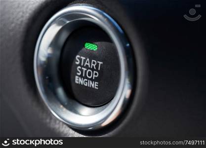 Closeup of a modern car interior with Start Stop engine button