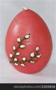 closeup of a pink egg shaped candle
