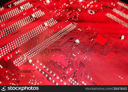 Closeup of a red printed circuit board