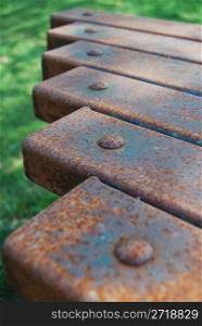 closeup of a rusty table using shallow depth of field