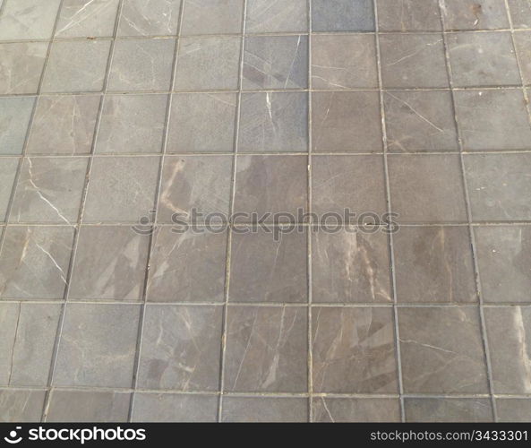 closeup of a section of square block paving