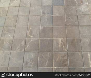 closeup of a section of square block paving