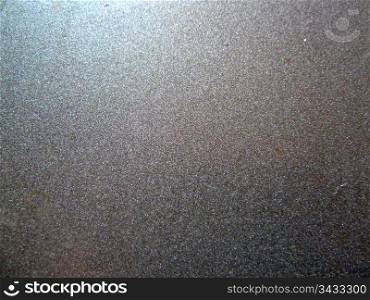 closeup of a textured silver surface