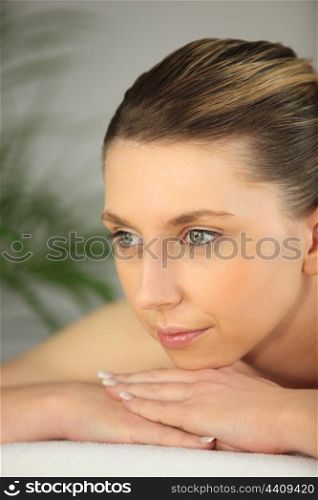Closeup of a woman having a back massage