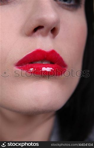 Closeup of a woman&rsquo;s red lipstick