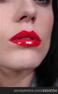 Closeup of a woman&rsquo;s red lipstick