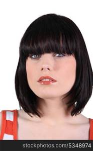 Closeup of a woman with a bobbed haircut