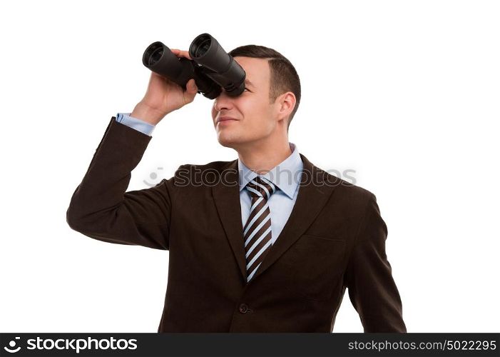 Closeup of a young business man looking through binocular isolated on white background