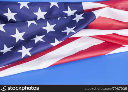 Closeup of American flag on blue background