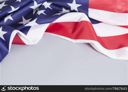 Closeup of American flag on gray background