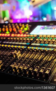 Closeup of an audio mixing control panel