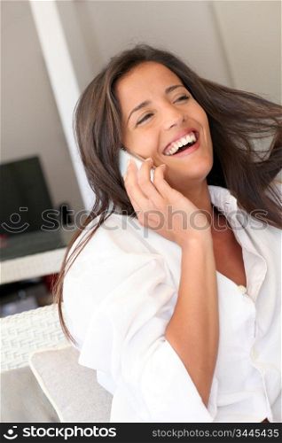 Closeup of attractive woman using cellphone