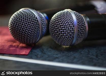 Closeup of audio microphones. Closeup of audio microphones on stage background