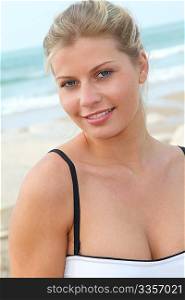 Closeup of beautiful blond woman in swimsuit