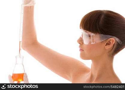 closeup of beautiful lab worker holding up test tube