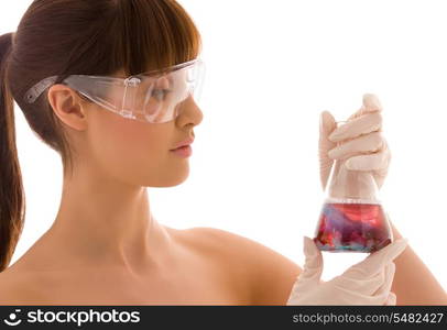 closeup of beautiful lab worker holding up test tube