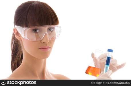 closeup of beautiful lab worker holding up test tubes