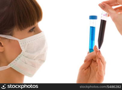 closeup of beautiful lab worker holding up test tubes