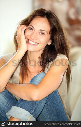 Closeup of beautiful woman relaxing at home