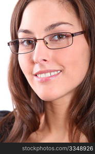 Closeup of beautiful woman wearing eyeglasses