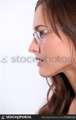 Closeup of beautiful woman wearing eyeglasses