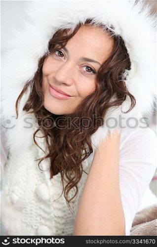 Closeup of beautiful woman with fur