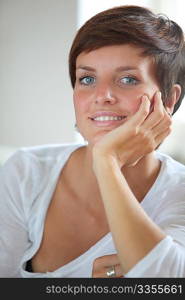 Closeup of beautiful young woman with blue eyes