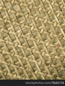 Closeup of beige basket. Wicker woven pattern for abstract background or texture