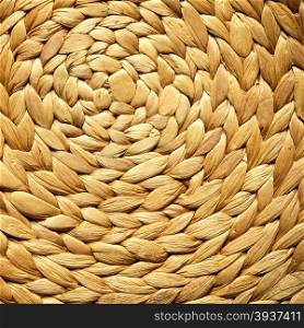 Closeup of beige basket. Wicker woven pattern for abstract background or texture. Square format.