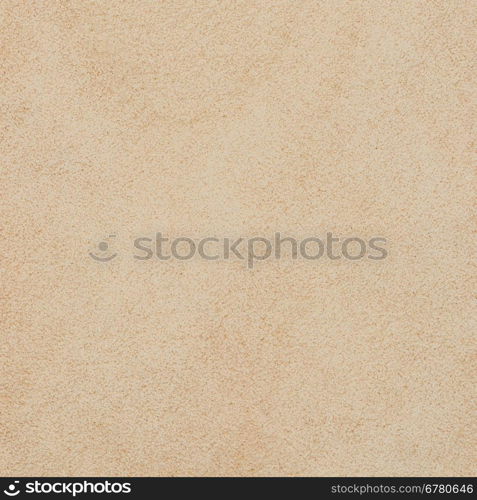 Closeup of beige leather texture background.