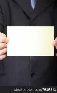 Closeup of blank business note card or signboard in man&#39;s hand