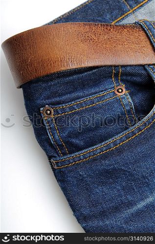 Closeup of brown belt on jeans