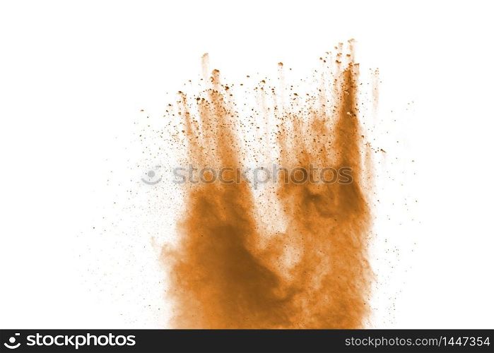 Closeup of brown powder particle splash isolated on white background.