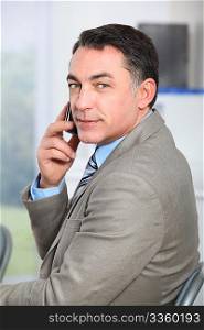 Closeup of businessman talking on the phone