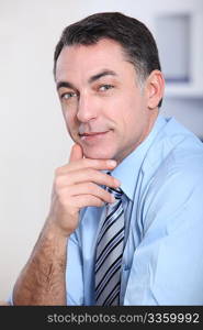 Closeup of businessman with blue shirt and tie