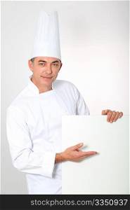 Closeup of chef showing white board