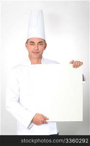 Closeup of chef showing white board